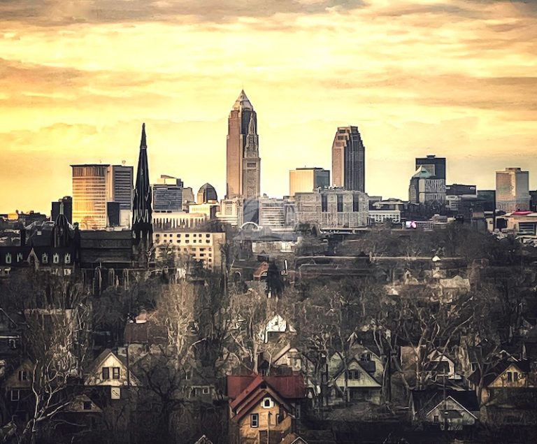Tremont, Ohio neighborhood photo with Cleveland skyline at sunset image.