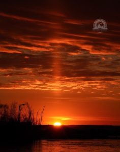 I caught this Lake Erie sun pillar in Lorain Ohio at sunset on a cold winter day - about 20 degrees.